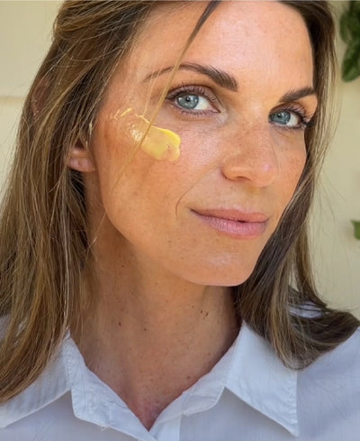Esthetician With Product On Skin