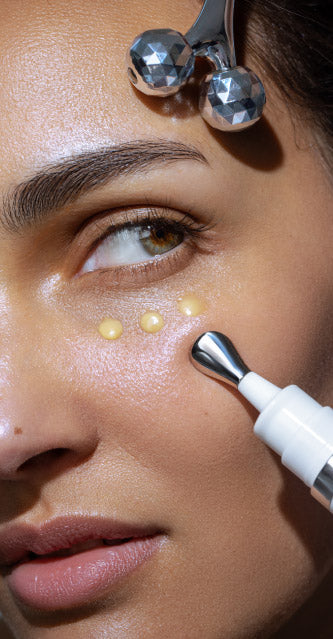 Woman Applying Eye Cream Under Eyes